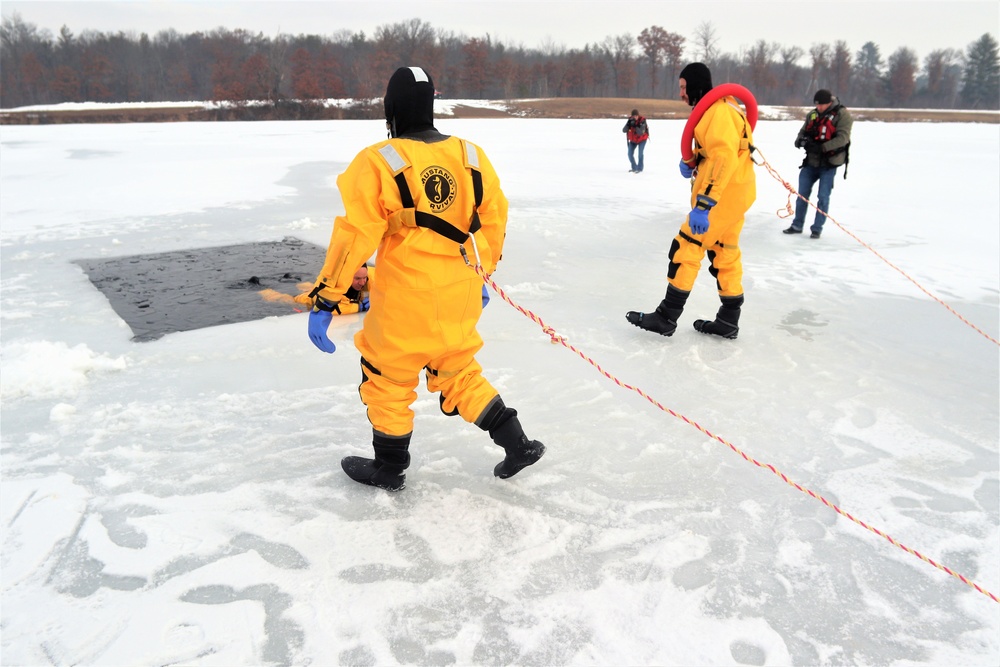 Fort McCoy firefighters train to save people clinging to ice with surface ice rescue training