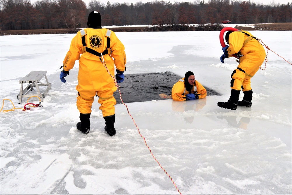 Fort McCoy firefighters train to save people clinging to ice with surface ice rescue training