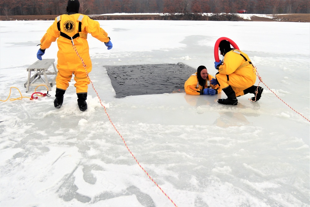 Fort McCoy firefighters train to save people clinging to ice with surface ice rescue training