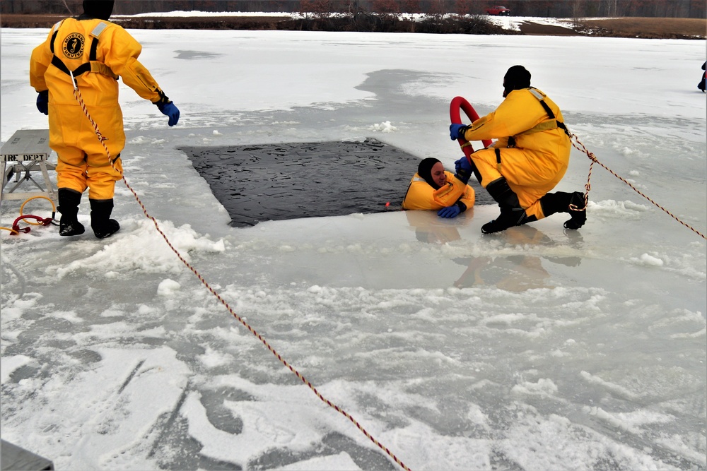 Fort McCoy firefighters train to save people clinging to ice with surface ice rescue training