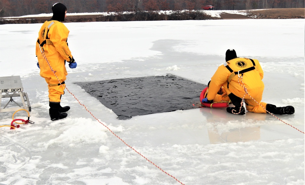 Fort McCoy firefighters train to save people clinging to ice with surface ice rescue training