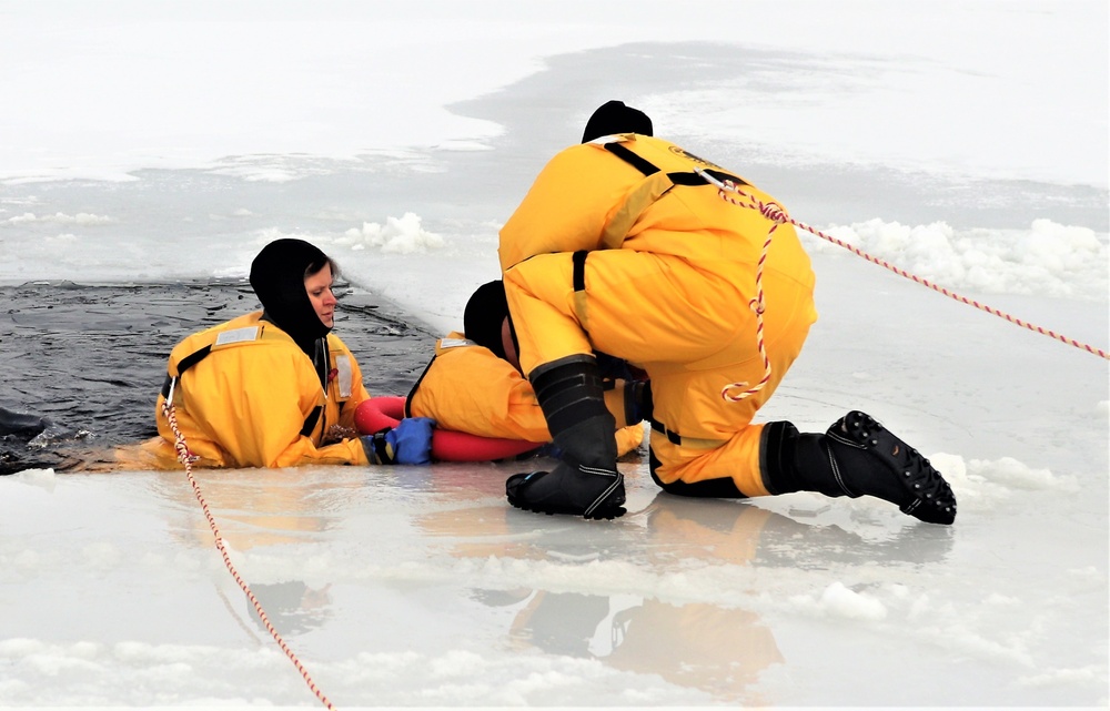 Fort McCoy firefighters train to save people clinging to ice with surface ice rescue training