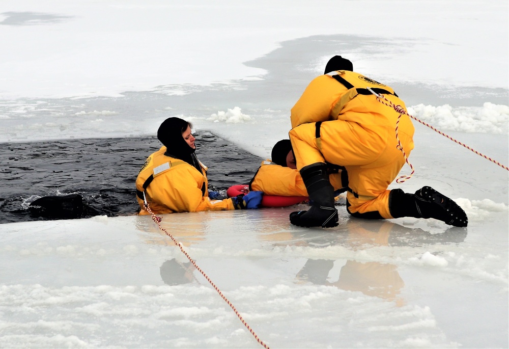 Fort McCoy firefighters train to save people clinging to ice with surface ice rescue training