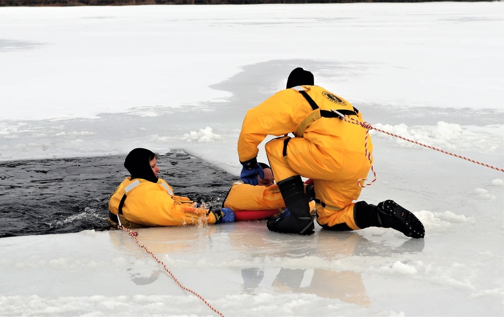 Fort McCoy firefighters train to save people clinging to ice with surface ice rescue training