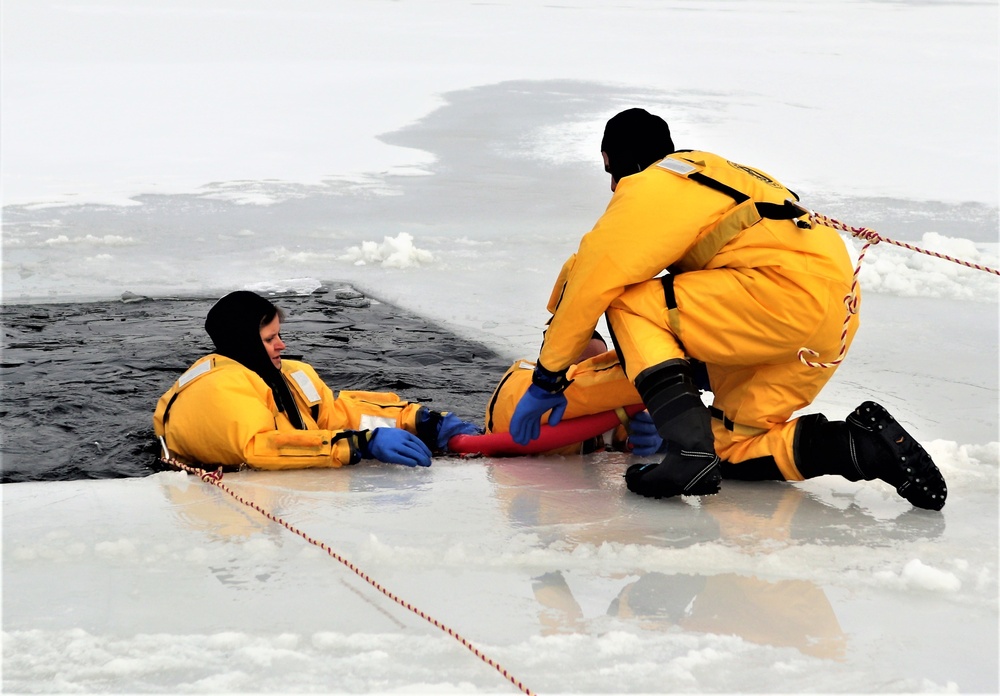 Fort McCoy firefighters train to save people clinging to ice with surface ice rescue training