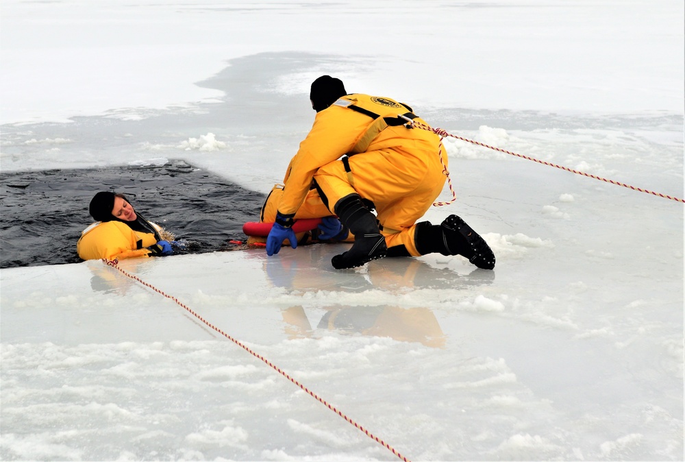 Fort McCoy firefighters train to save people clinging to ice with surface ice rescue training