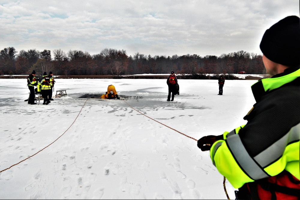 Fort McCoy firefighters train to save people clinging to ice with surface ice rescue training