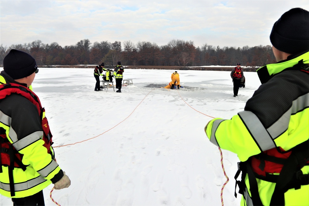 Fort McCoy firefighters train to save people clinging to ice with surface ice rescue training