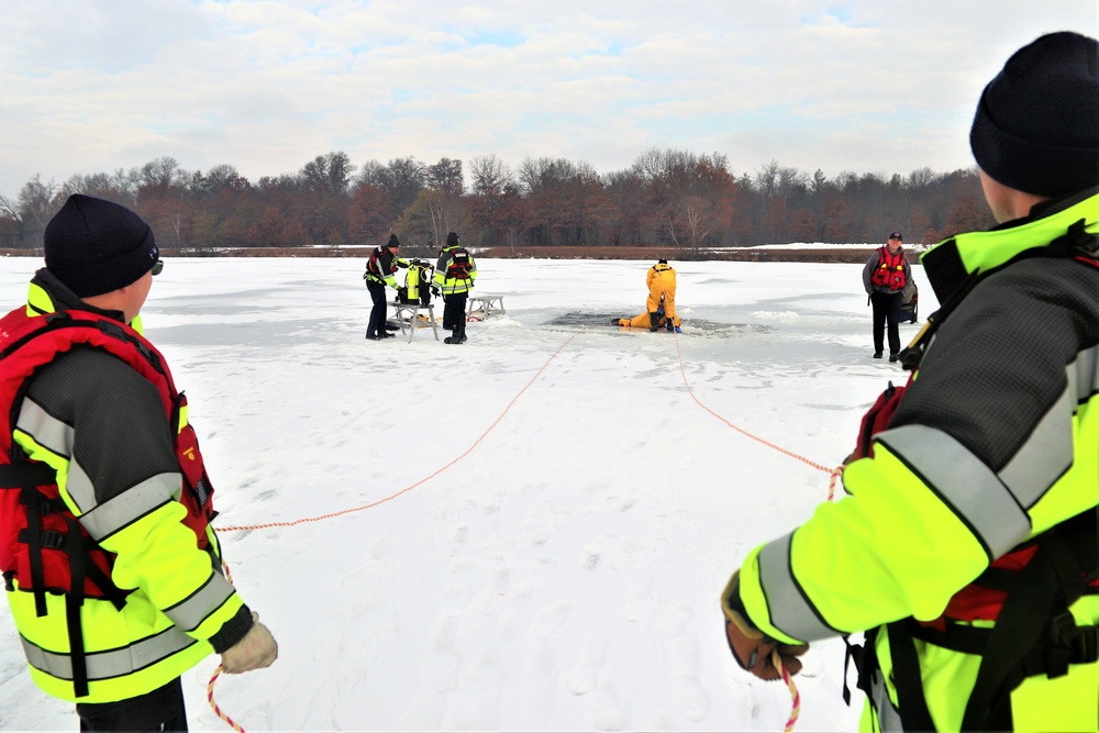 Fort McCoy firefighters train to save people clinging to ice with surface ice rescue training