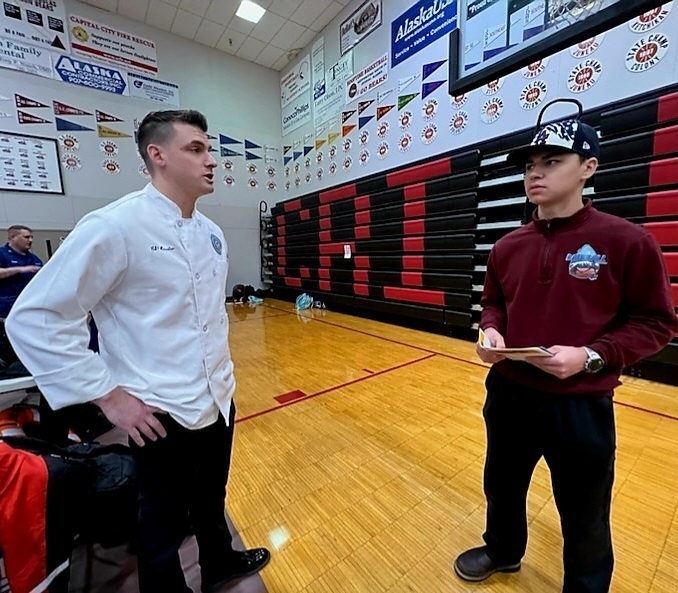 CS1 Zach Hassilev volunteering at Juneau-Douglas High School