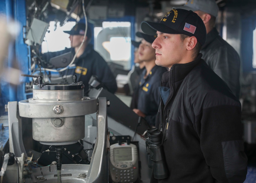 USS Chancellorsville Sailors stand watch on the bridge