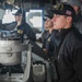 USS Chancellorsville Sailors stand watch on the bridge