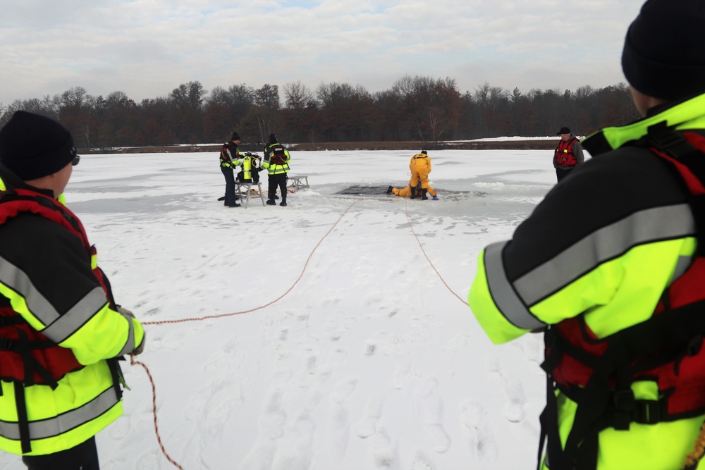 Fort McCoy firefighters train to save people clinging to ice with surface ice rescue training