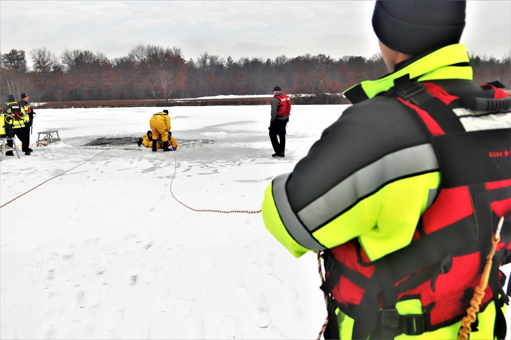 Fort McCoy firefighters train to save people clinging to ice with surface ice rescue training