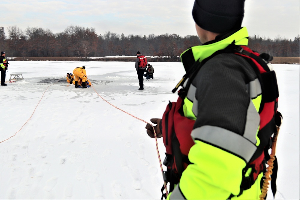 Fort McCoy firefighters train to save people clinging to ice with surface ice rescue training