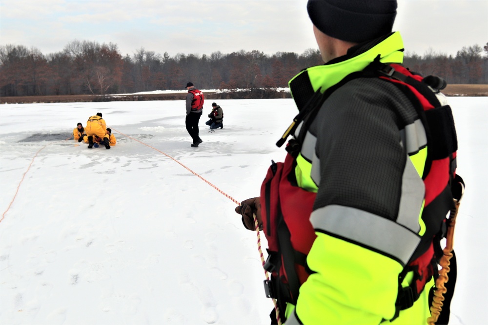 Fort McCoy firefighters train to save people clinging to ice with surface ice rescue training