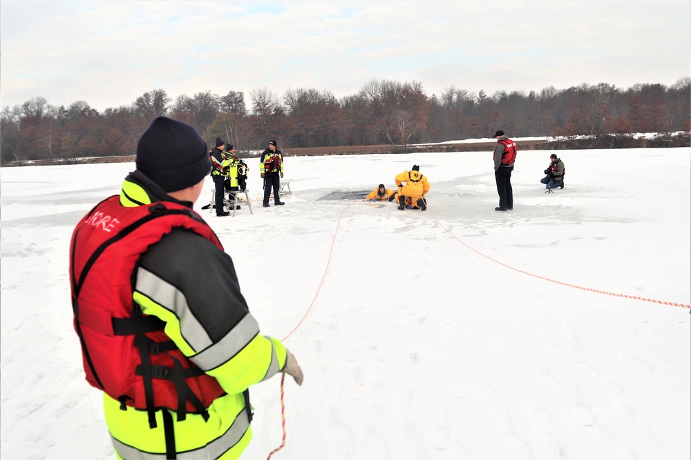 Fort McCoy firefighters train to save people clinging to ice with surface ice rescue training