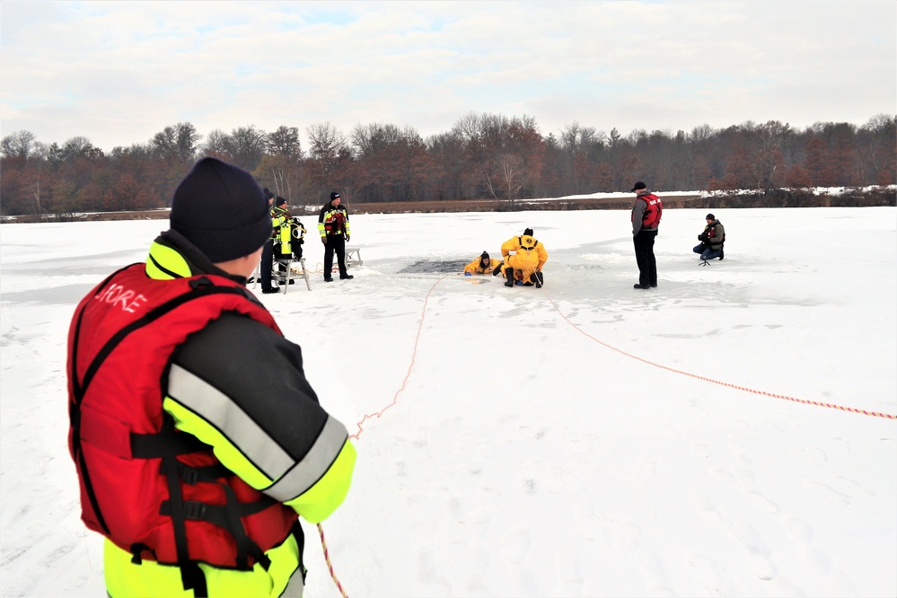 Fort McCoy firefighters train to save people clinging to ice with surface ice rescue training