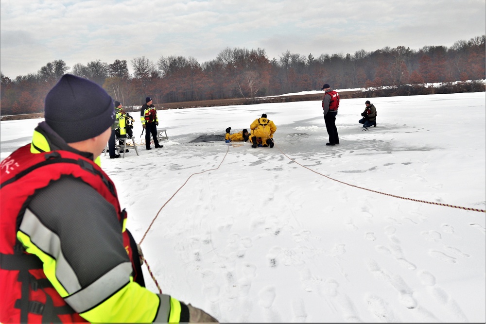 Fort McCoy firefighters train to save people clinging to ice with surface ice rescue training