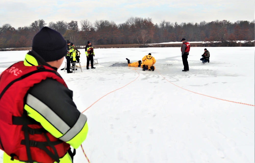 Fort McCoy firefighters train to save people clinging to ice with surface ice rescue training