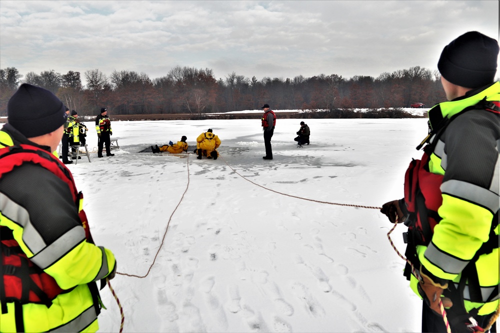 Fort McCoy firefighters train to save people clinging to ice with surface ice rescue training