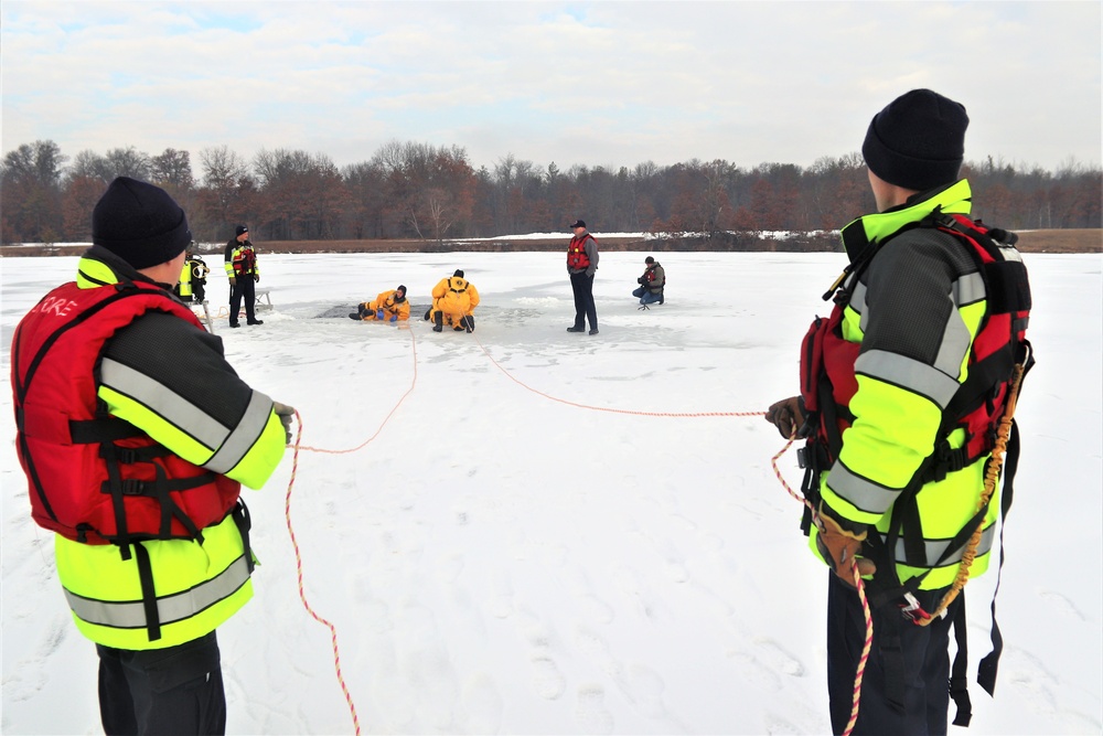 Fort McCoy firefighters train to save people clinging to ice with surface ice rescue training