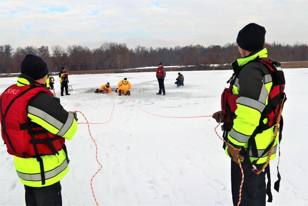 Fort McCoy firefighters train to save people clinging to ice with surface ice rescue training