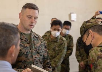 U.S. Marines with 3rd Maintenance Battalion demonstrate manufacturing capabilities to Japan Ground Self-Defense Force Ordnance School Leadership 