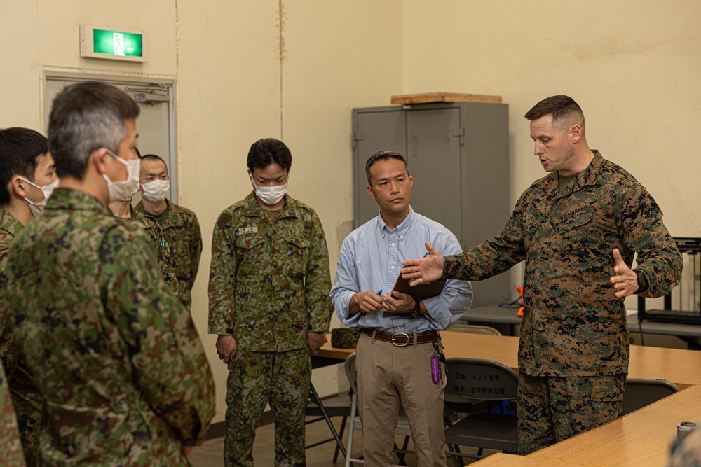 .S. Marines with 3rd Maintenance Battalion demonstrate manufacturing capabilities to Japan Ground Self-Defense Force Ordnance School Leadership 
