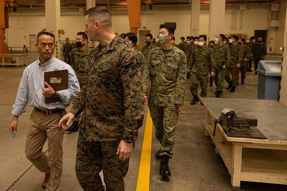 U.S. Marines with 3rd Maintenance Battalion demonstrate manufacturing capabilities to Japan Ground Self-Defense Force Ordnance School Leadership 