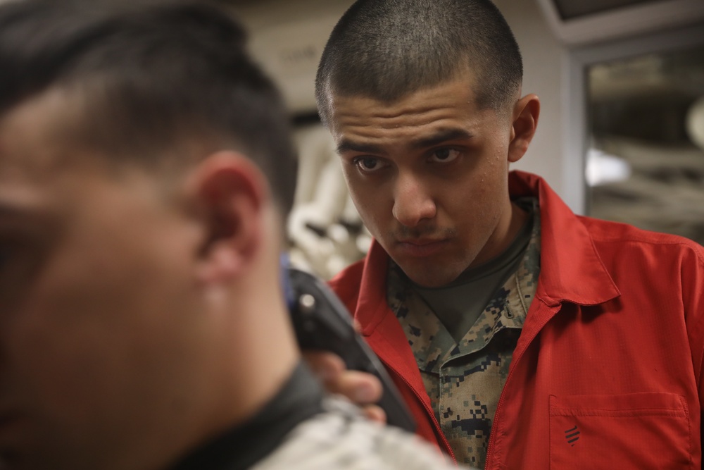 U.S. Marine Provides a Haircut During Deployment