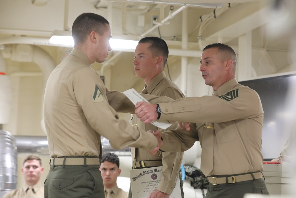 U.S. Marines Graduate Lance Cpl. Seminar Aboard USS John P. Murtha