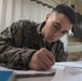 U.S. Marines Study for College Aboard USS John P. Murtha