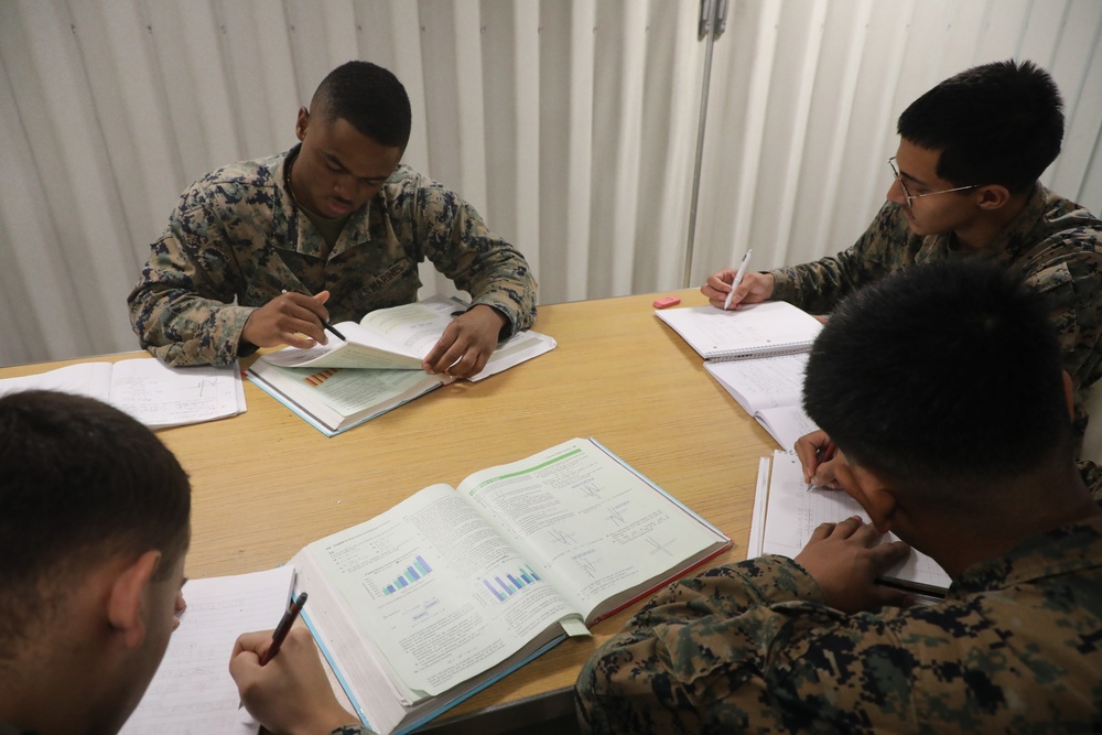 U.S. Marines Study for College Aboard USS John P. Murtha