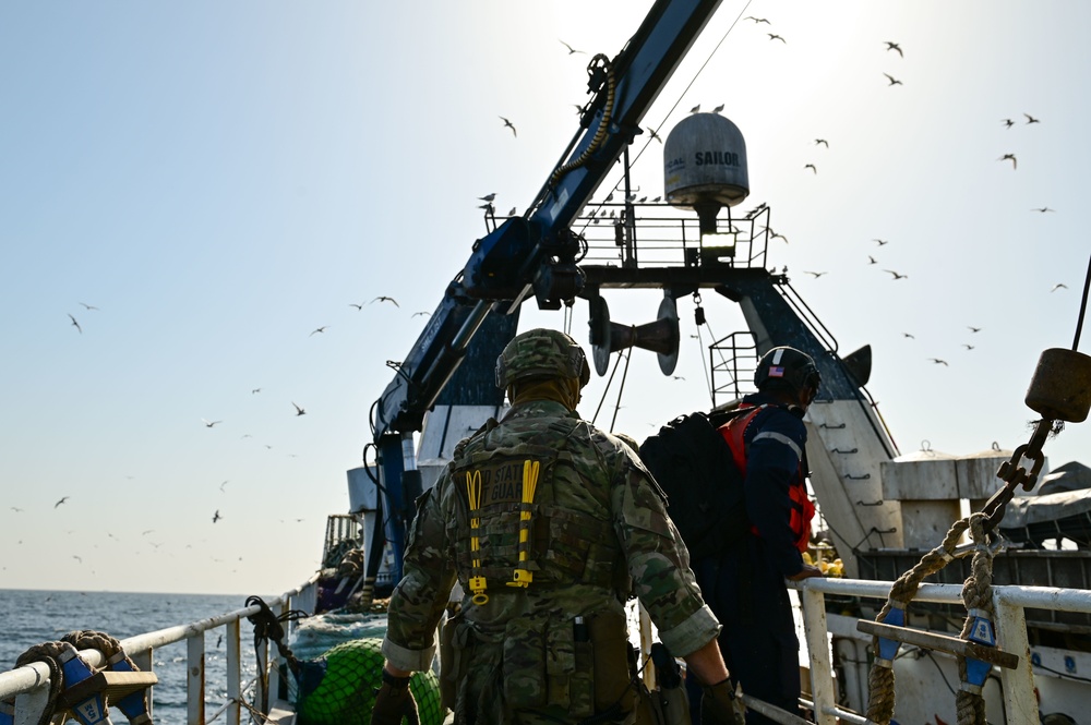 USCGC Spencer (WMEC 905) conducts a boarding with Senegal Navy partner