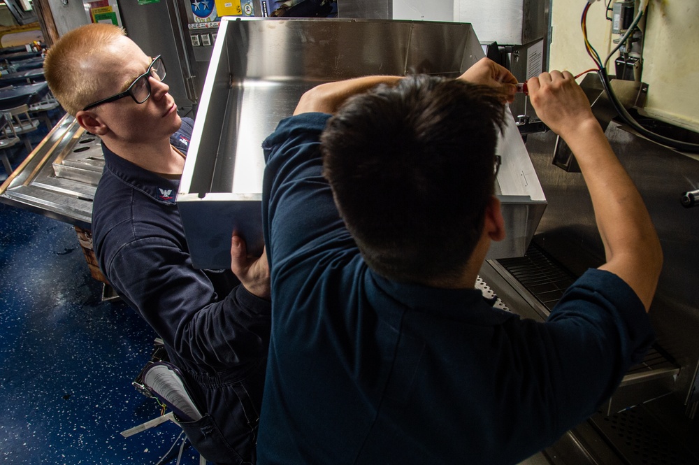 Sailors Replace A Gear Motor