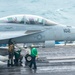 Sailors Secure An F/A-18F Super Hornet To Catapult