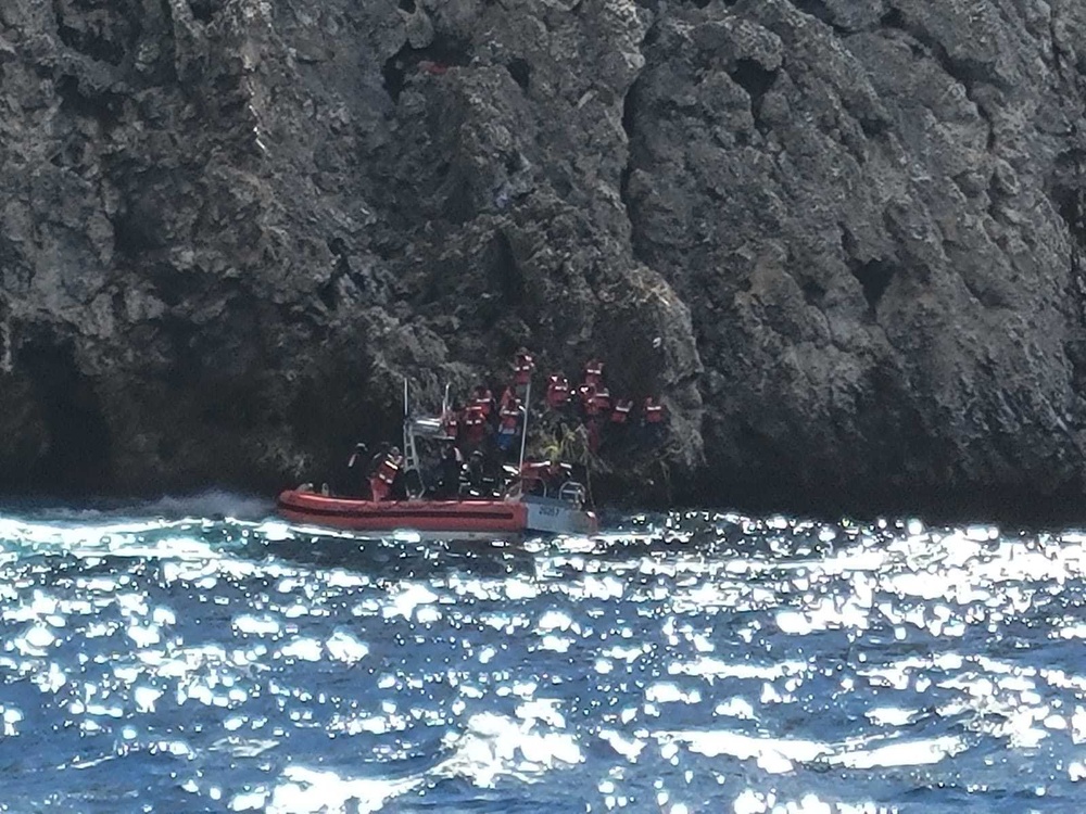 Coast Guard rescues 55 migrants who were left stranded by smugglers on Monito Island, Puerto Rico
