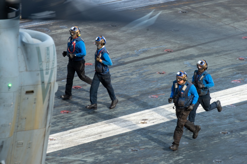 U.S. Navy Sailors Prepare To Remove Chocks And Chains