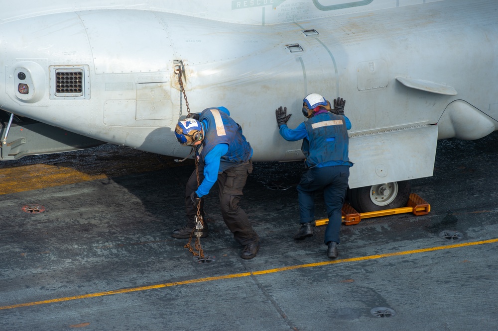 U.S. Navy Sailors Remove Chocks And Chains