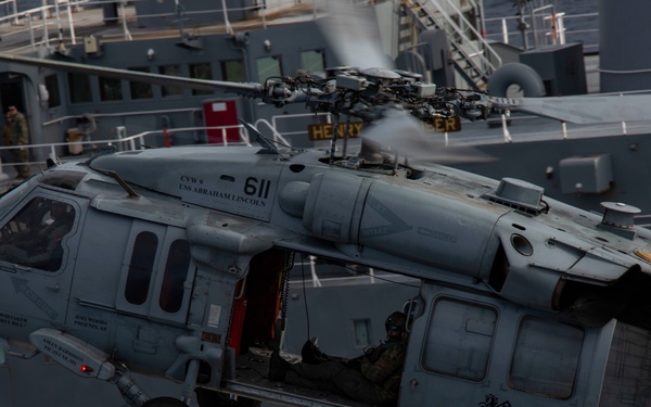 Abraham Lincoln conducts an ammunition transfer