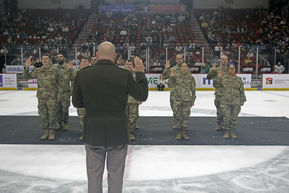 Maj. Gen. Baker reenlists Reserve Soldiers at Iowa Wild game