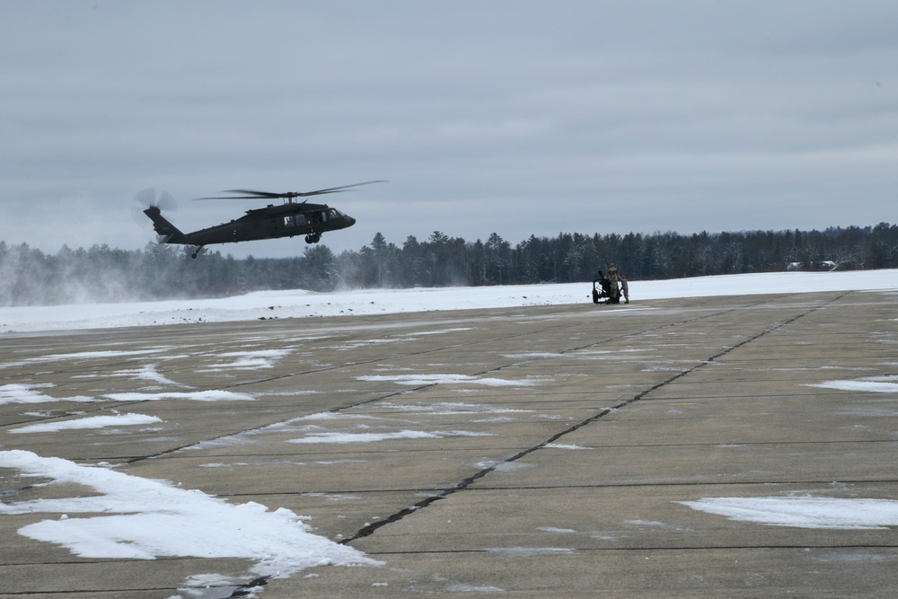 147th Aviation Regiment, 120th Field Artillery Regiment conduct sling loads