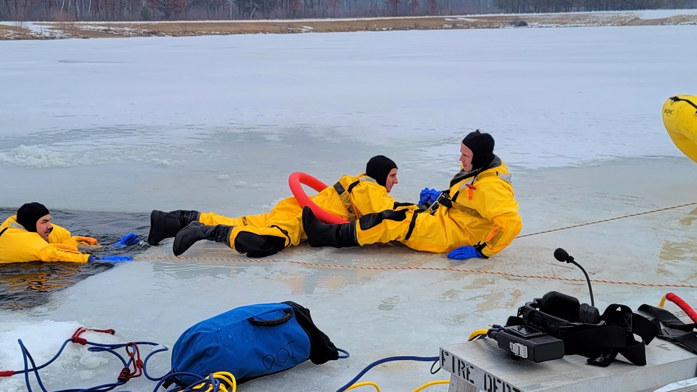 Fort McCoy firefighters train to save people clinging to ice with surface ice rescue training