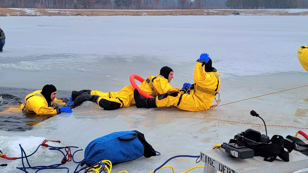 Fort McCoy firefighters train to save people clinging to ice with surface ice rescue training