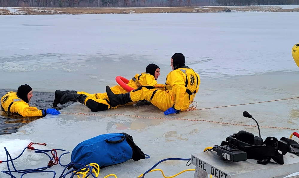 Fort McCoy firefighters train to save people clinging to ice with surface ice rescue training