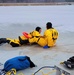 Fort McCoy firefighters train to save people clinging to ice with surface ice rescue training