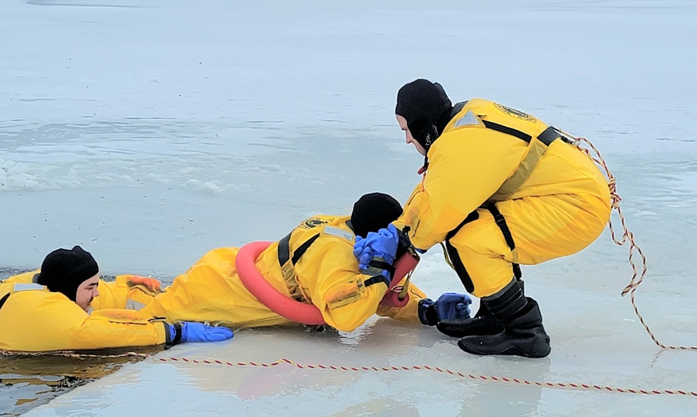 Fort McCoy firefighters train to save people clinging to ice with surface ice rescue training