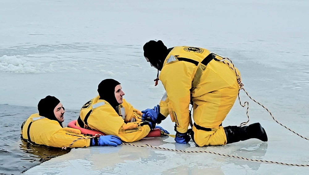 Fort McCoy firefighters train to save people clinging to ice with surface ice rescue training