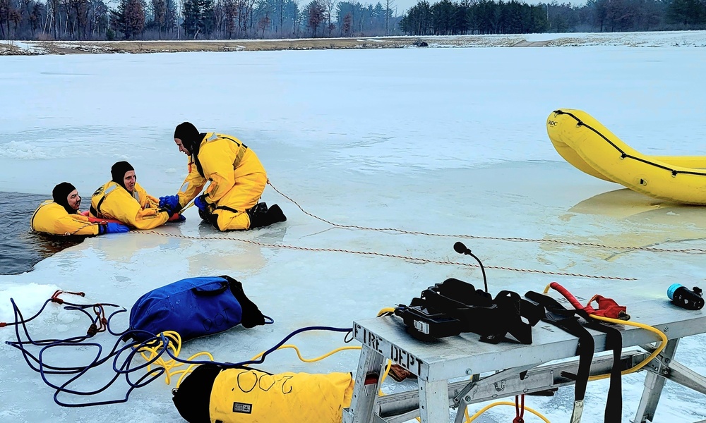 Fort McCoy firefighters train to save people clinging to ice with surface ice rescue training